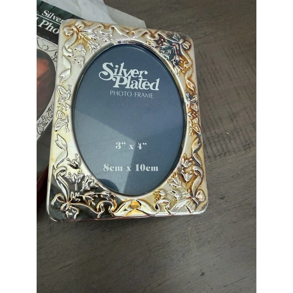 Silver Plated 3x4 (8cm X 10cm) Frame Floral And Ribbon Designed Edges